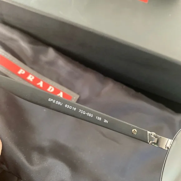 Prada sunglasses with the glasses bag and box